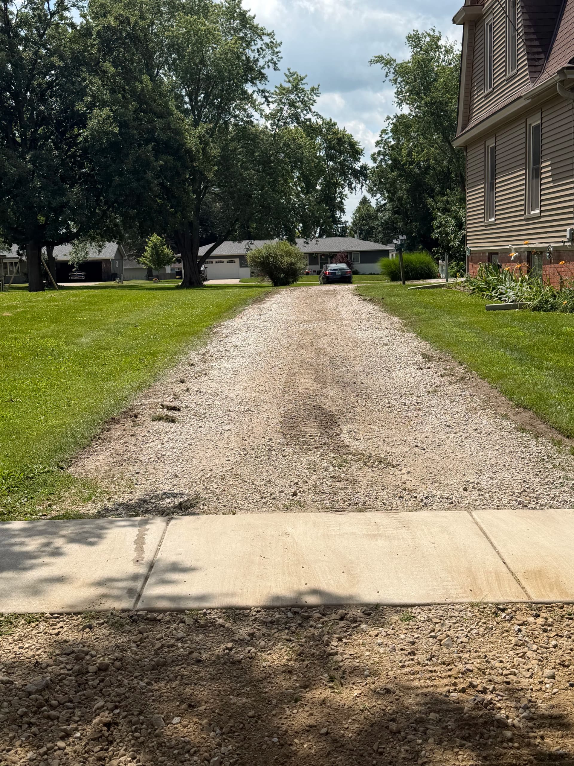 Gallery photos for Old Gravel Driveway Gets a Fresh Start Without a Full Replacement: Image #1