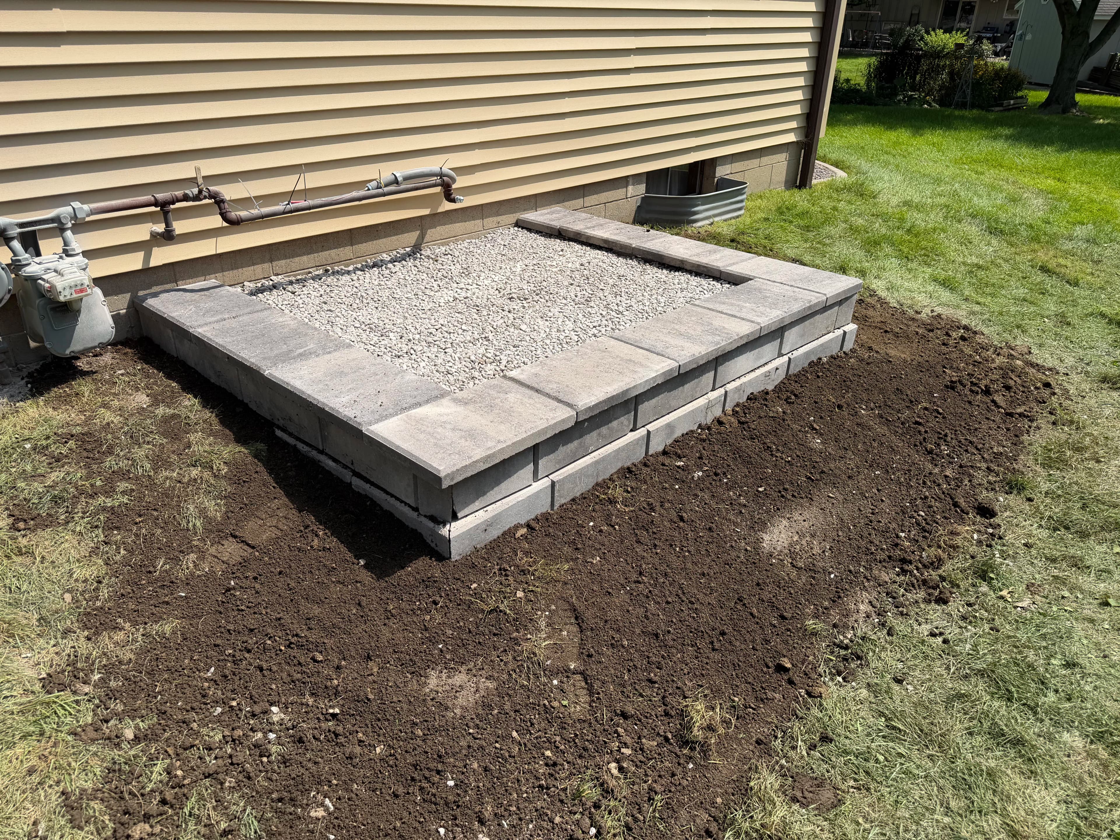 Project Retaining Wall and Generator Pad Done Right image