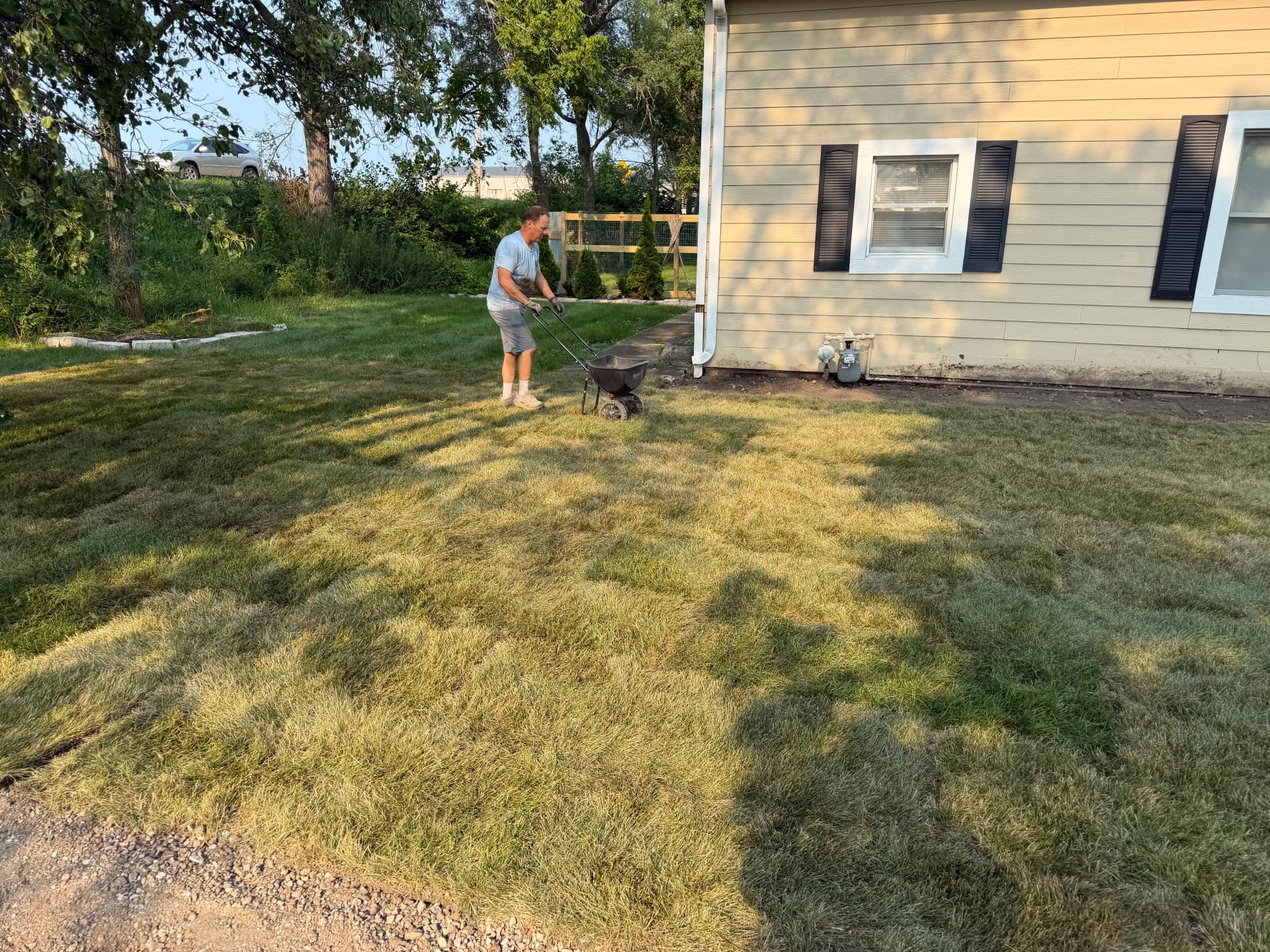 Gallery photos for Fresh Grade and Sod Install Turns a Rough Yard Into a Usable Space: Image #1